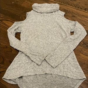 Sweater with shoulder cut outs